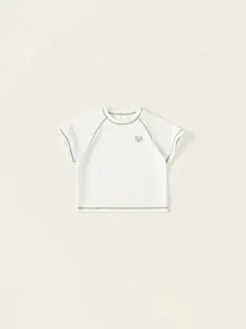 Kids minimalist white cotton t-shirt with green contrast stitching and heart print