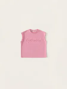Pink sleeveless kids cotton vest with embossed Optimism lettering and round neck design