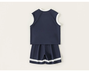 Detail view of navy blue cotton kids tank top and matching shorts with white piping