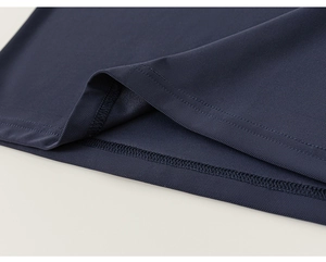 Detailed macro view of navy blue quick-dry breathable mesh fabric and flat stitching