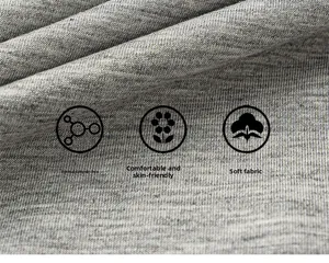 Detail view of soft grey knit fabric for children trousers showing skin-friendly texture