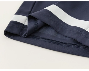 Macro view of navy blue mesh fabric with breathable texture and white stripes detail
