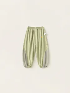 Kids breathable anti-mosquito pants in light green with mesh panels and star detail