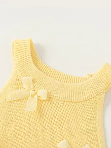 Sweet lemon yellow knitted tank top for girls featuring cute bow accents on the neckline