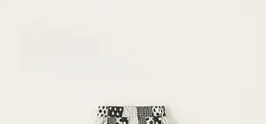 Detail shot of elastic waistband on kids black and white patterned bloomers