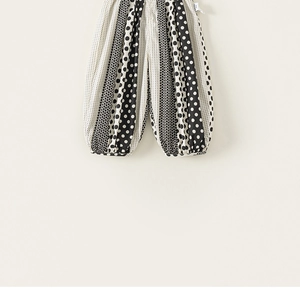 Detail of girls polka dot bloomers showing elastic waistband and soft fabric texture