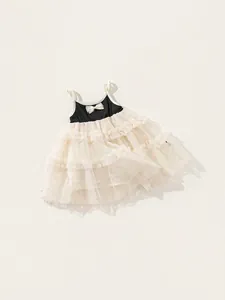 Girls princess tutu dress with black bodice, white bow and layered gold sequin tulle skirt