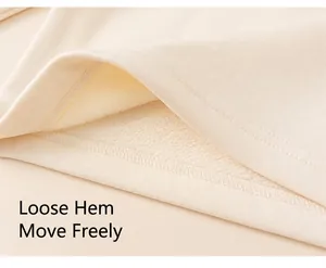 Detailed close-up showing beige fleece lining and high-quality hem stitching on girl's top