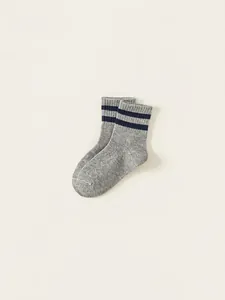 Classic preppy style kids' gray knit crew socks with double dark blue sporty stripes