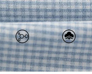 Macro shot of soft blue plaid fabric texture for children's breathable cotton dress