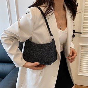 Elegant black glitter crescent hobo bag for women with woven texture and metallic shine