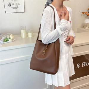 Brown leather bucket bag with gold buckle for women, stylish large capacity shoulder bag