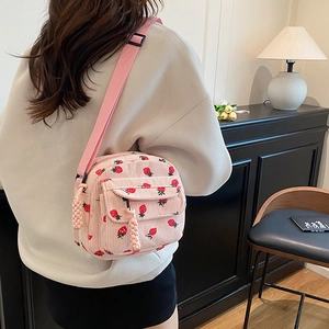 Vintage pink corduroy crossbody bag with red strawberry pattern for daily use