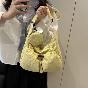 Große gelbe Nylon-Tragetasche mit Kordelzug und kleiner Münztasche für Damen