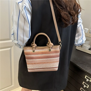 Minimalist woven straw crossbody handbag with gradient brown and beige pattern detail