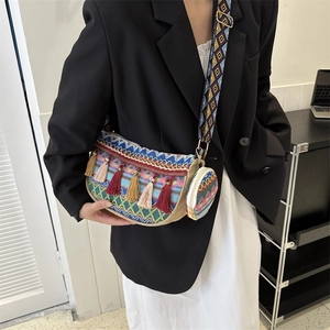 Ethnic embroidery bucket bag with fringe, wide strap and mini round purse accessory
