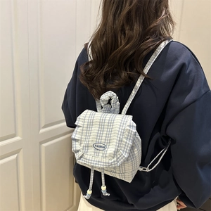 Mini Japanese style blue and white plaid backpack with embroidery and ruffle details