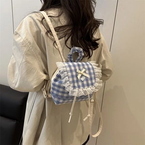 Mini blue plaid backpack for women featuring lace trim and a cute bow decoration