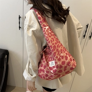 Pink leopard print hobo bag with large capacity and durable shoulder strap for daily wear