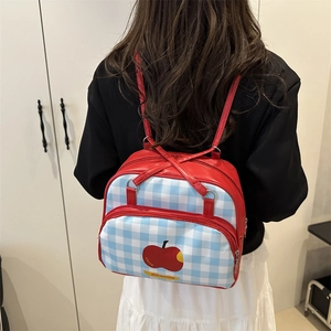 Student backpack with blue gingham pattern and red apple print for casual daily wear