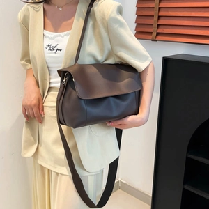 Minimalist dark brown PU leather tote bag with flap closure and adjustable shoulder strap