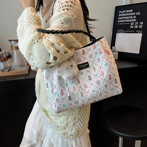 Fashionable white tote bag with cartoon patterns and black braided handles for women
