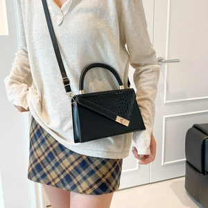 Chic black crocodile embossed leather crossbody bag with gold buckle for women