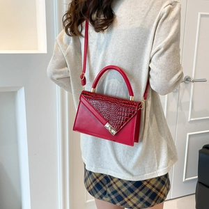 Red crocodile pattern crossbody bag with golden metal buckle for women in daily casual style
