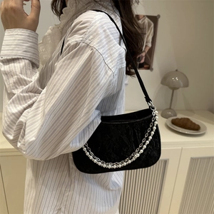 Black butterfly baguette shoulder bag with pearl chain and silver metal accents