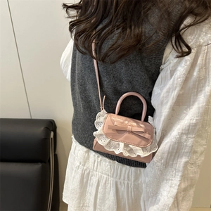 Pink mini crossbody bag with bow decoration and white lace trim for girls and mothers