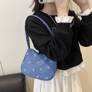 Blue denim underarm bag featuring mini bow embroidery and casual half-moon design for women