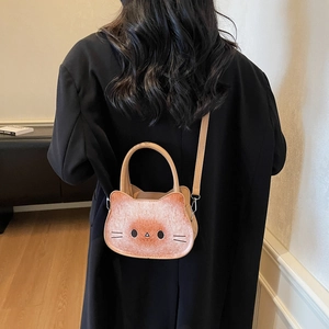 Cute cartoon cat toast crossbody bag with top handle and slim strap on model