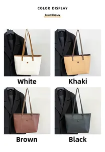 Nuancier de grands sacs cabas en blanc, kaki, marron et noir en cuir grainé