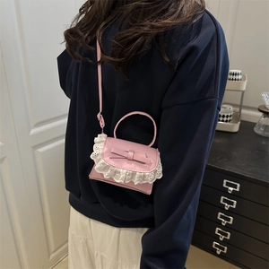 Pink mini crossbody bag with bow decoration and lace embroidery trim for women