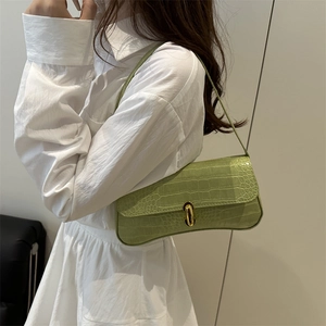 Elegant matcha green crocodile pattern baguette shoulder bag with gold metal clasp detail