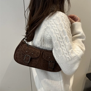 Brown suede leopard print underarm bag with metal buckles and vintage baguette style