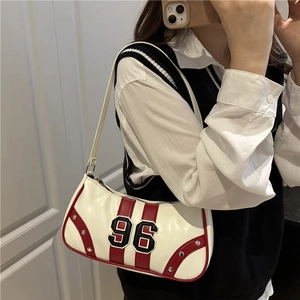 Vintage-style white underarm bag with red stripes, number 96 patch, and silver rivets