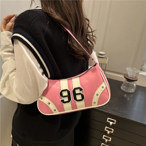 Pink underarm bag with white racing stripes, metal rivets, and number 96 embroidery
