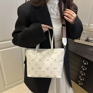 White jacquard tote bag with cartoon pattern and stylish wide fabric shoulder strap