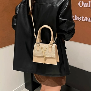 Chic cream mini leather crossbody bag with glitter flap and gold V hardware for women