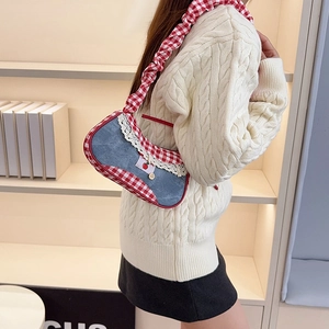 Chic blue denim underarm bag with red plaid trim and delicate white lace details