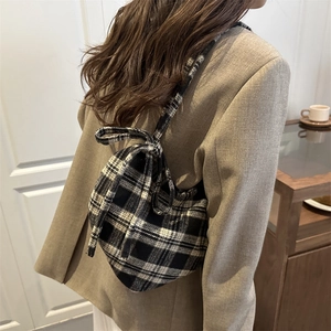 Classic black and white plaid tweed shoulder bag with stylish bow strap for women