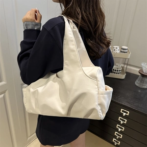 Large capacity ivory nylon sports tote bag for women, lightweight and waterproof design