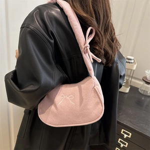 Pink corduroy shoulder bag with bow embroidery and knot strap for casual commute