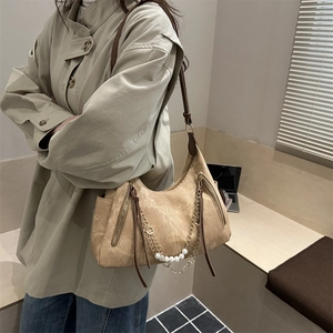 Retro light brown leather tote bag with stylish gold hardware and pearl chain decoration
