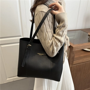 Classic black PU leather tote bag for women with gold lettering and adjustable shoulder strap