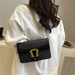 Retro black chain shoulder bag with monogram print and vintage gold metal lock