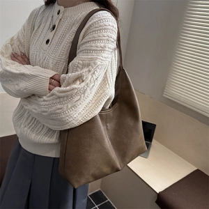 Large capacity dark brown PU leather tote bag with stylish vertical stitching and soft hobo shape