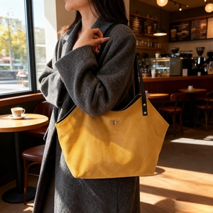 Chic yellow quilted suede tote bag with metal twist lock and large capacity for daily use