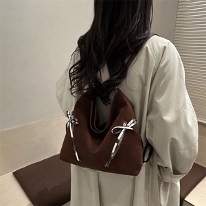 Brown large capacity tote bag for women featuring stylish ribbon bows and gold hardware